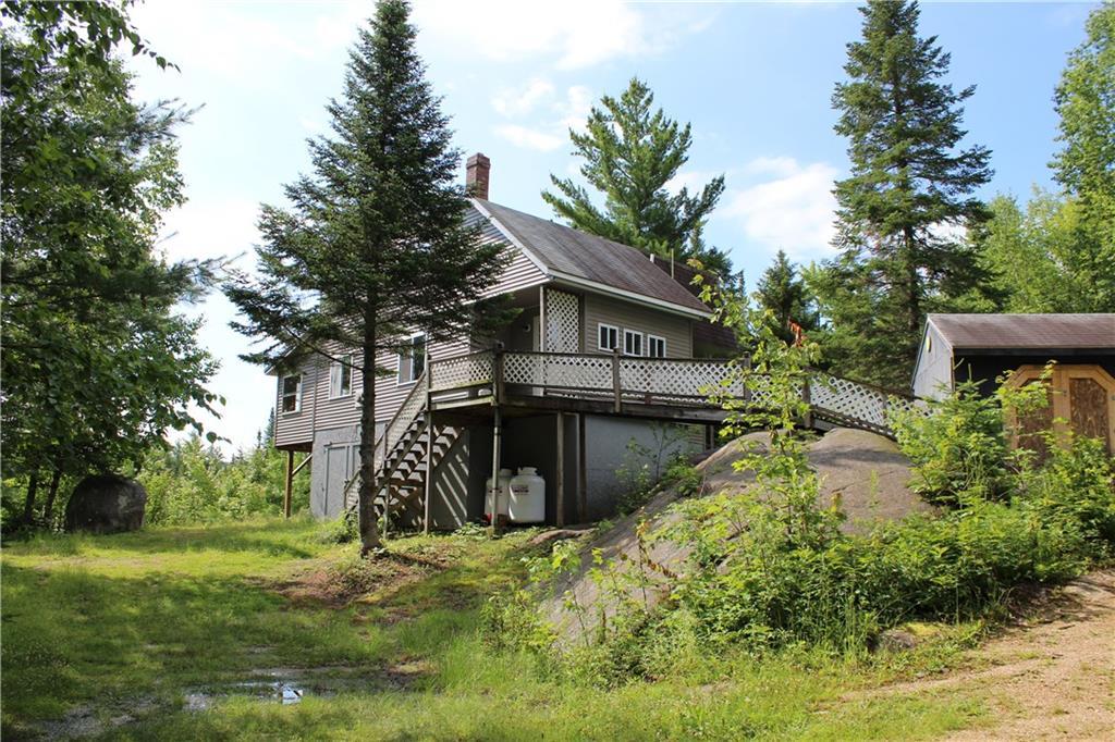 585 Old Spencer Road West Forks, ME 04985 - Photo 1 of 33 View of camp from driveway. ...