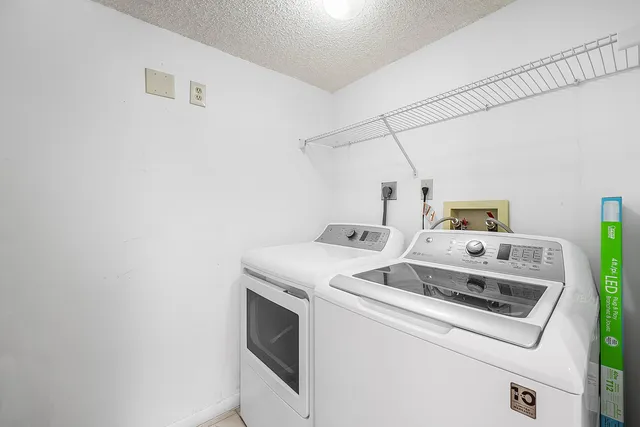 a workspace with furniture and wooden floor