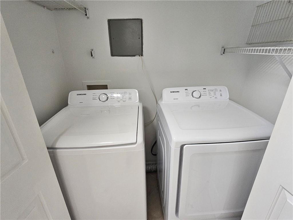 3334 Peachtree Road Northeast, Unit 403 Atlanta, GA 30326 - Photo 20 of 52 a utility room with dryer and washer