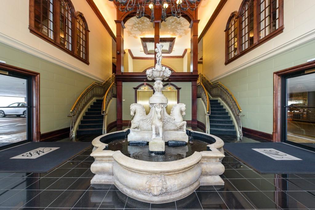 3334 Peachtree Road Northeast, Unit 403 Atlanta, GA 30326 - Photo 32 of 52 a view of hall way with furniture and chandelier