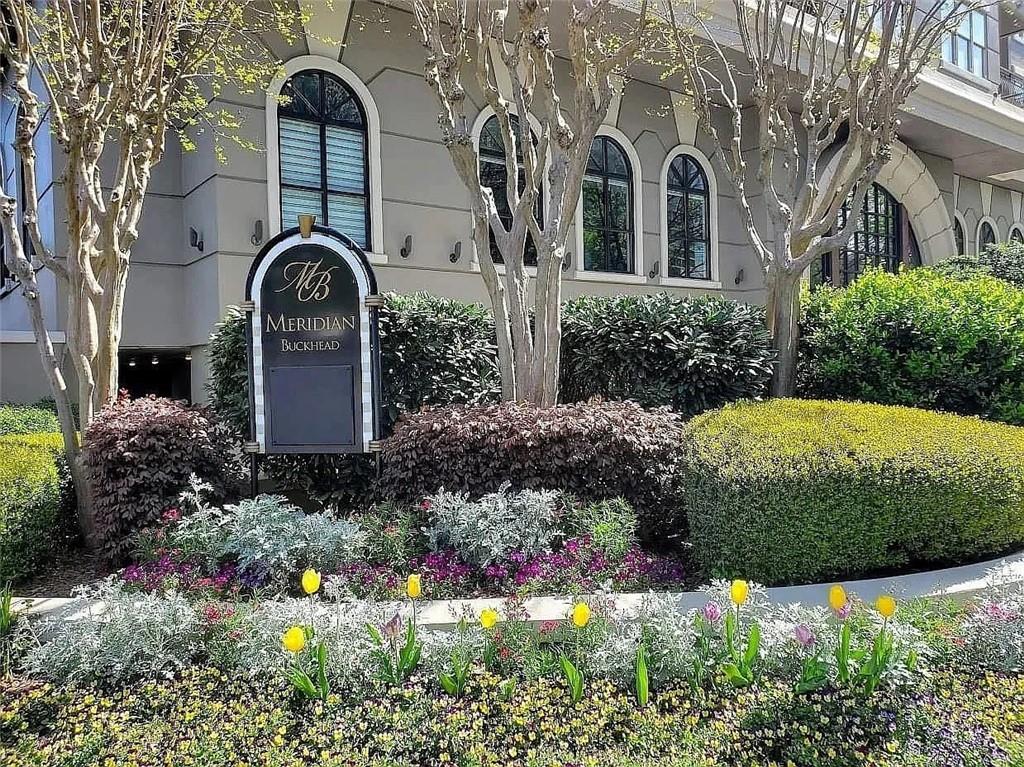3334 Peachtree Road Northeast, Unit 403 Atlanta, GA 30326 - Photo 45 of 52 a front view of a house with garden
