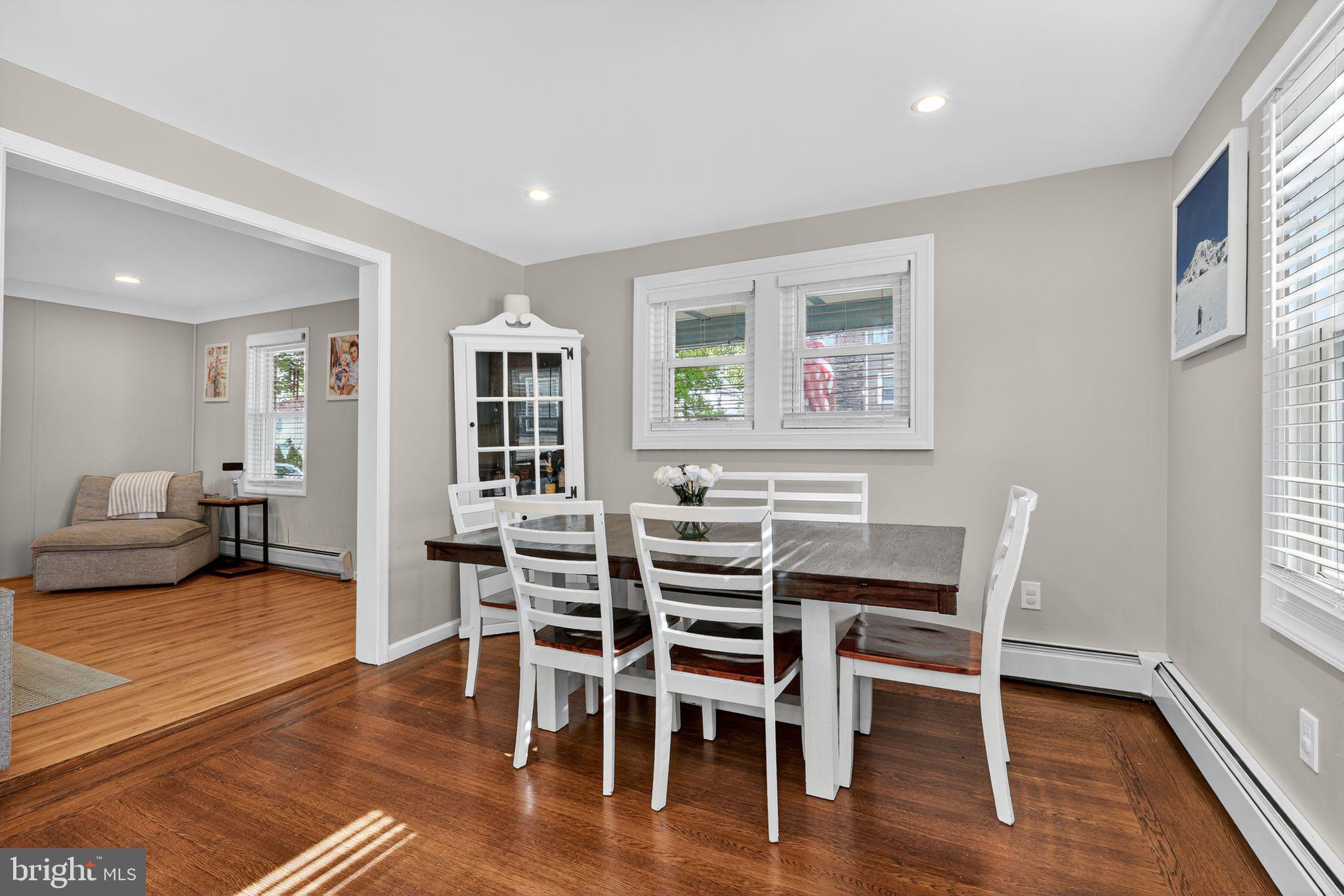 214 Lynbrooke Road Springfield, PA 19064 - Photo 19 of 42 a view of a dining room with furniture and wooden floor