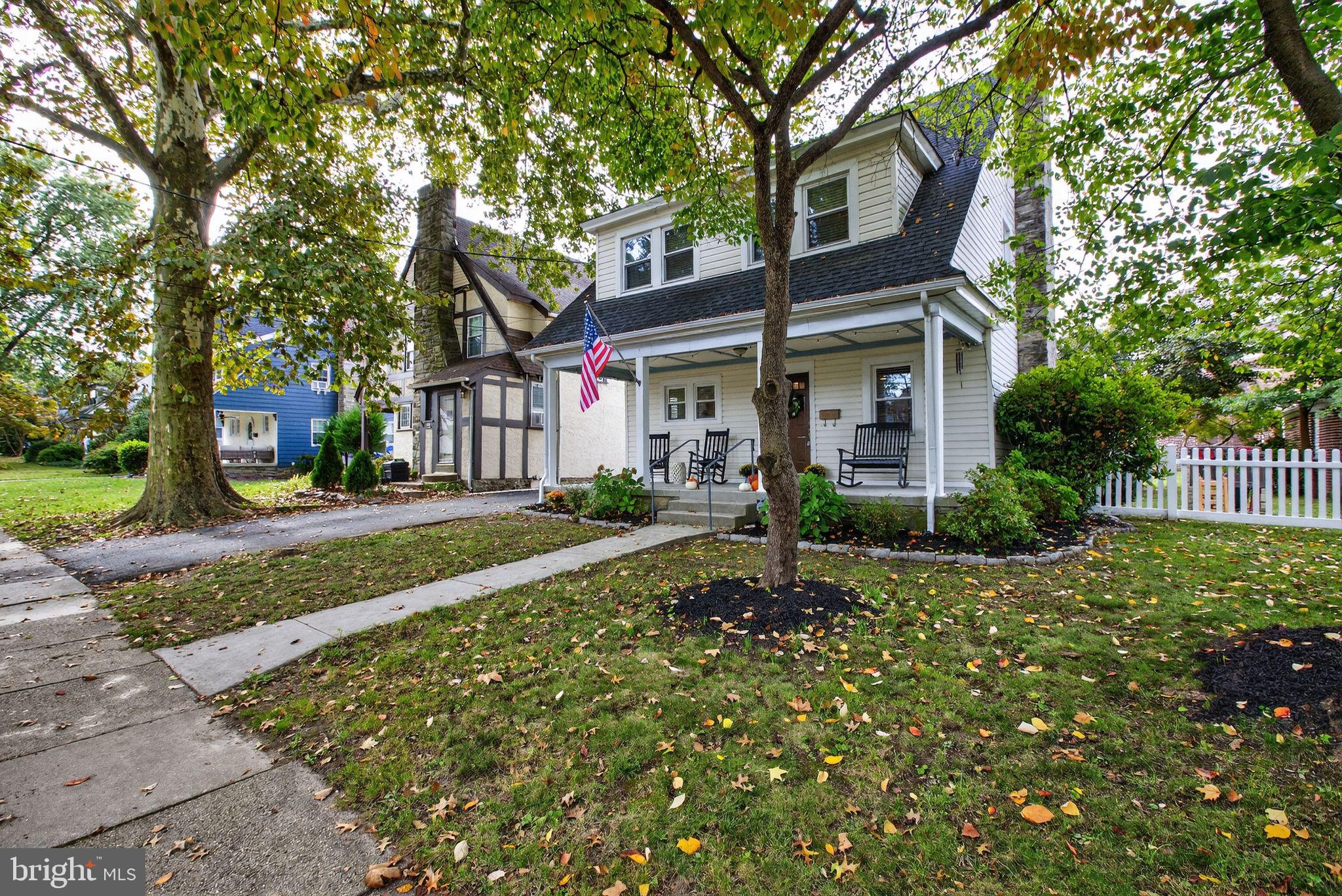 214 Lynbrooke Road Springfield, PA 19064 - Photo 2 of 42 a front view of a house with a yard