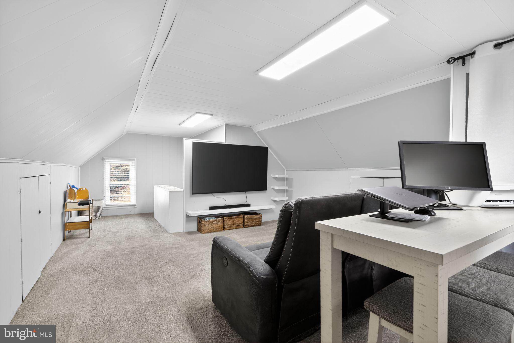 214 Lynbrooke Road Springfield, PA 19064 - Photo 31 of 42 a view of a livingroom with workspace and a couch