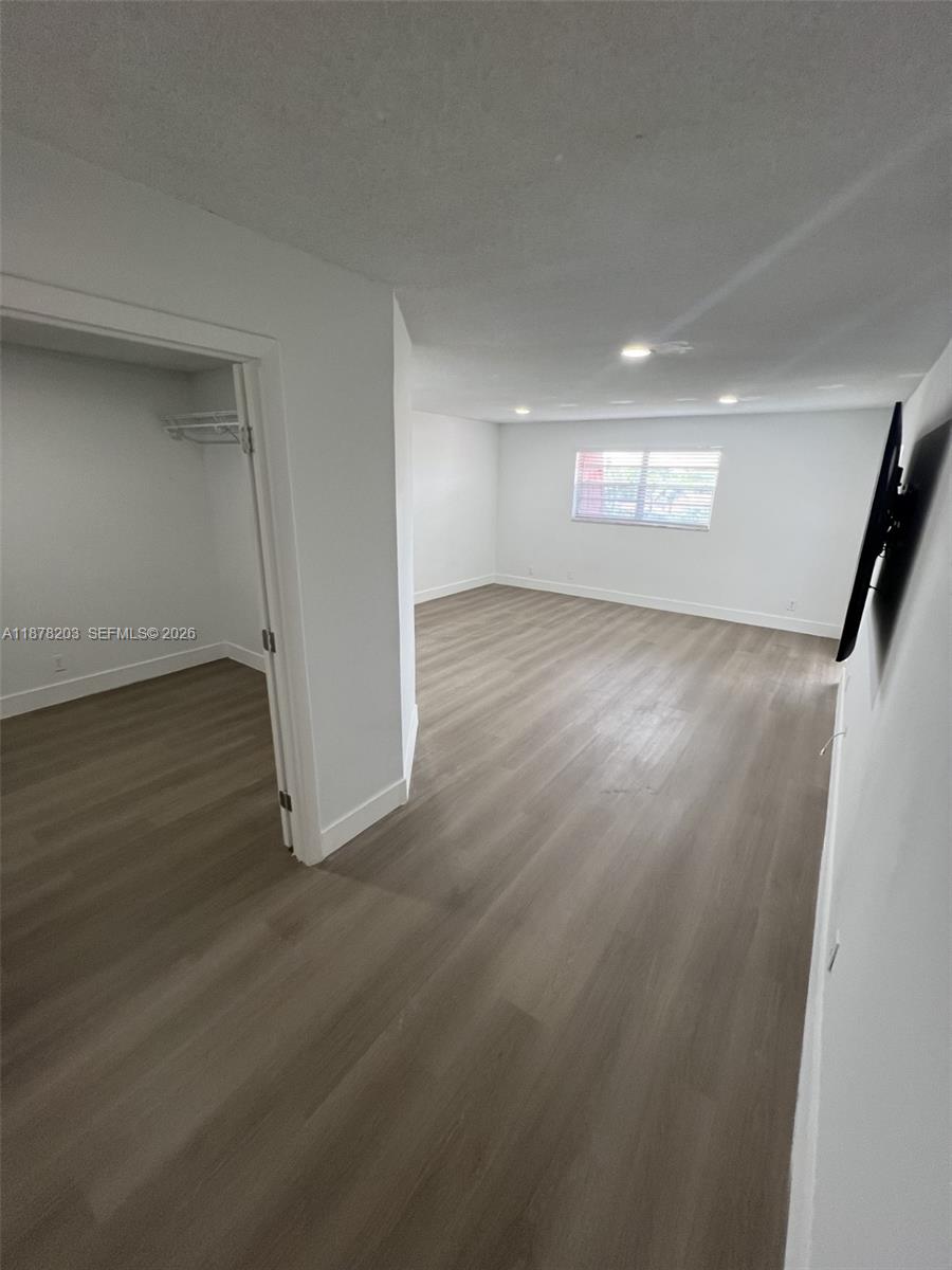 22605 Southwest 66th Avenue, Unit 403 Boca Raton, FL 33428 - Photo 18 of 20 a view of a hallway