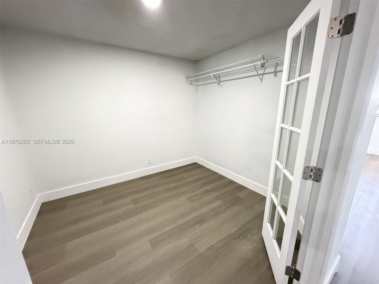 22605 Southwest 66th Avenue, Unit 403 Boca Raton, FL 33428 - Photo 5 of 20 a view of an empty room