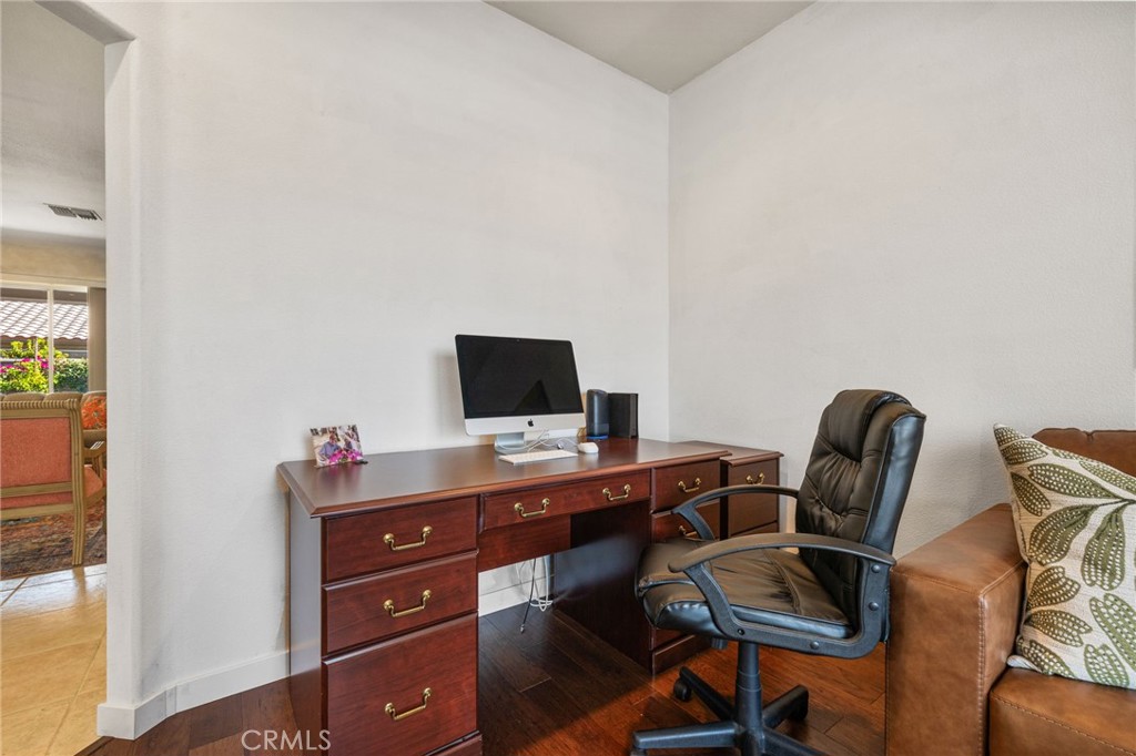 78770 Golden Reed Drive Palm Desert, CA 92211 - Photo 24 of 36 a view of a workspace with furniture