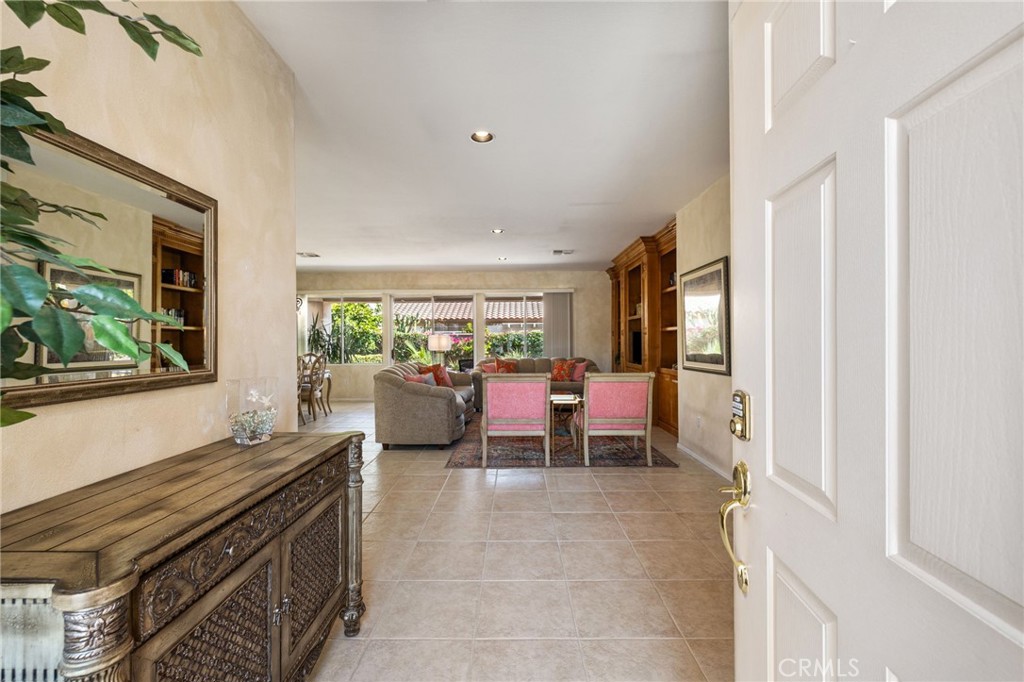 78770 Golden Reed Drive Palm Desert, CA 92211 - Photo 25 of 36 a living room with chairs and window