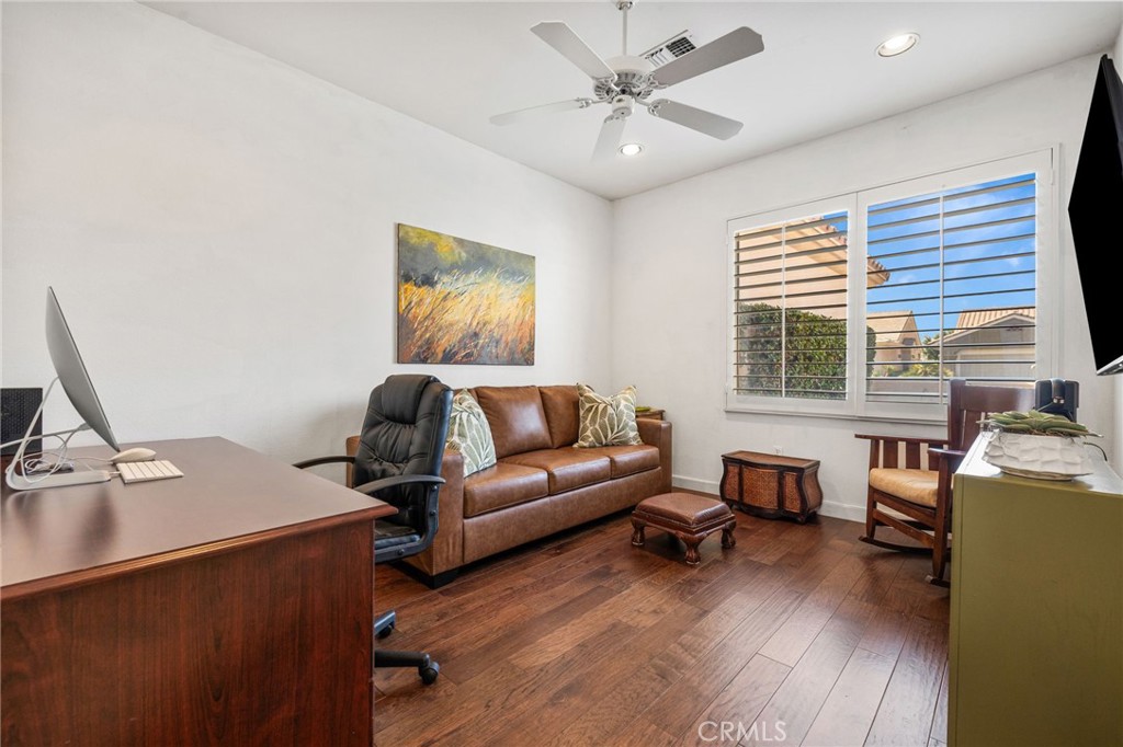 78770 Golden Reed Drive Palm Desert, CA 92211 - Photo 26 of 36 a living room with furniture and a window