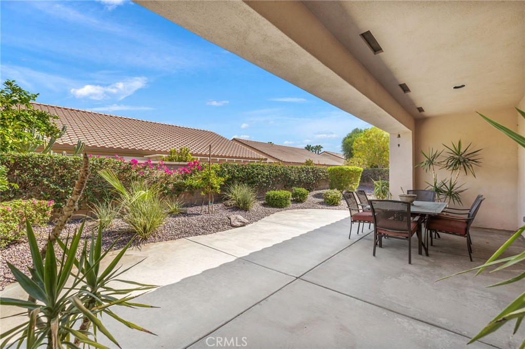 78770 Golden Reed Drive Palm Desert, CA 92211 - Photo 8 of 36 a patio with patio area and outdoor seating