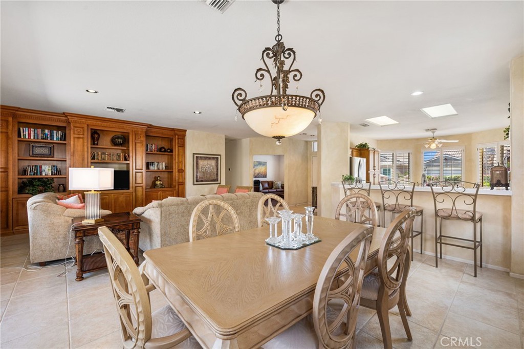 78770 Golden Reed Drive Palm Desert, CA 92211 - Photo 9 of 36 a very nice looking dining room with a table and chairs