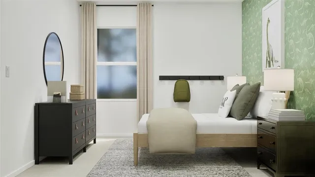 a bedroom with a bed and a mirror