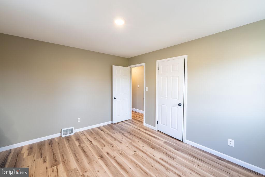 706 Center Street Kennett Square, PA 19348 - Photo 20 of 39 a view of a room with wooden floor