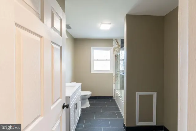 a bathroom with a sink and a toilet
