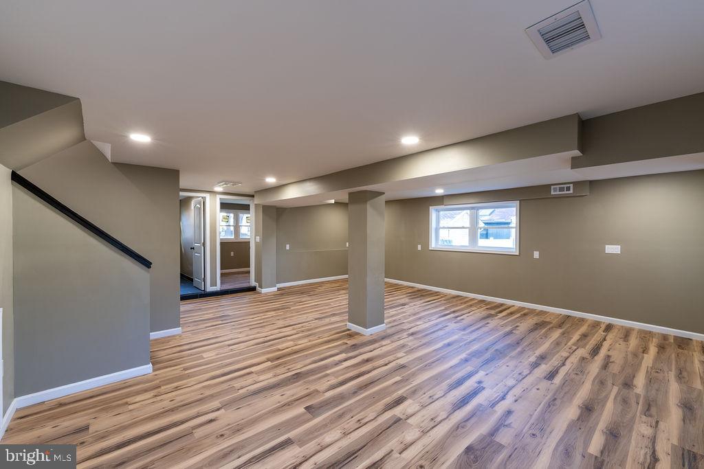 706 Center Street Kennett Square, PA 19348 - Photo 10 of 39 a view of empty room with wooden floor