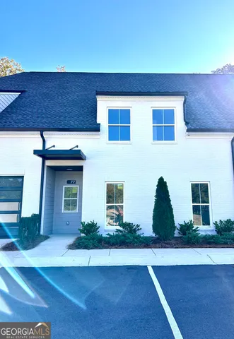 a house view with a garden space