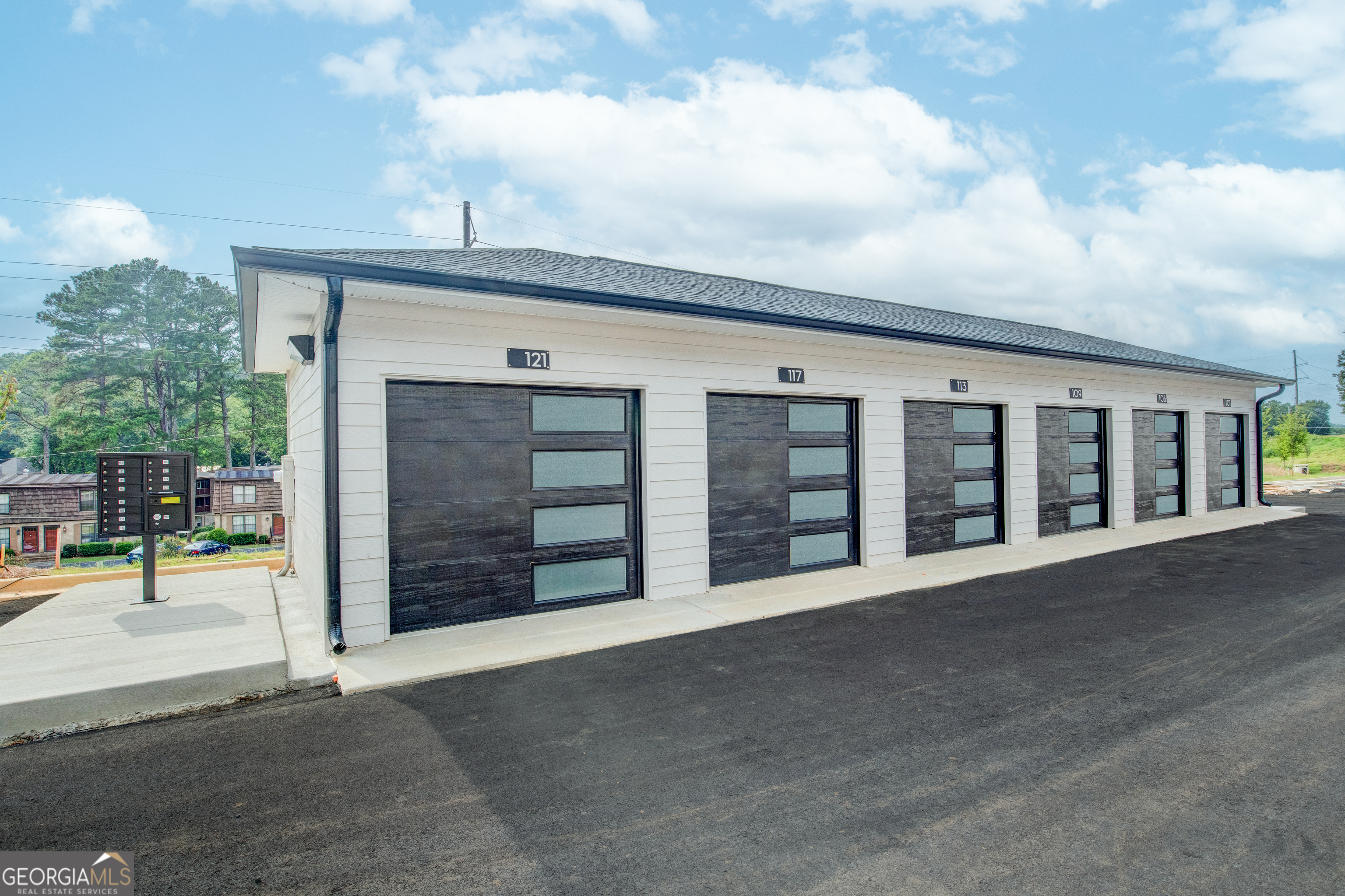 77 Chateau Drive Southeast Rome, GA 30161 - Photo 5 of 31 a view of a house with barbeque and wooden fence