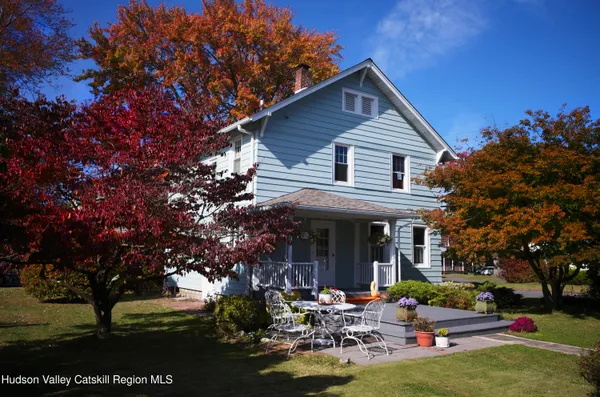 a front view of a house with patio