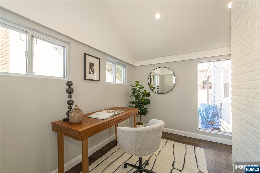 1169 Broad Street Bloomfield, NJ 07003 - Photo 17 of 47 a very nice looking room with a table and chairs