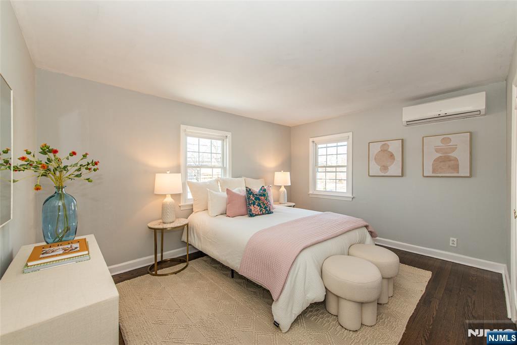 1169 Broad Street Bloomfield, NJ 07003 - Photo 31 of 47 a bedroom with a bed and window