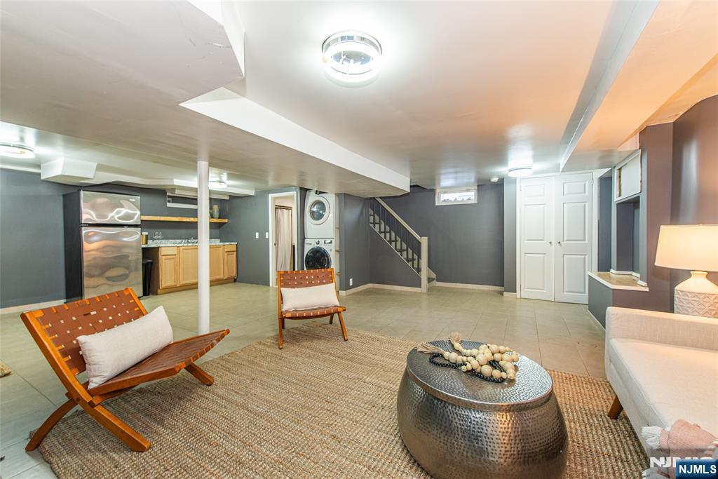 1169 Broad Street Bloomfield, NJ 07003 - Photo 38 of 47 a living room with furniture and a table