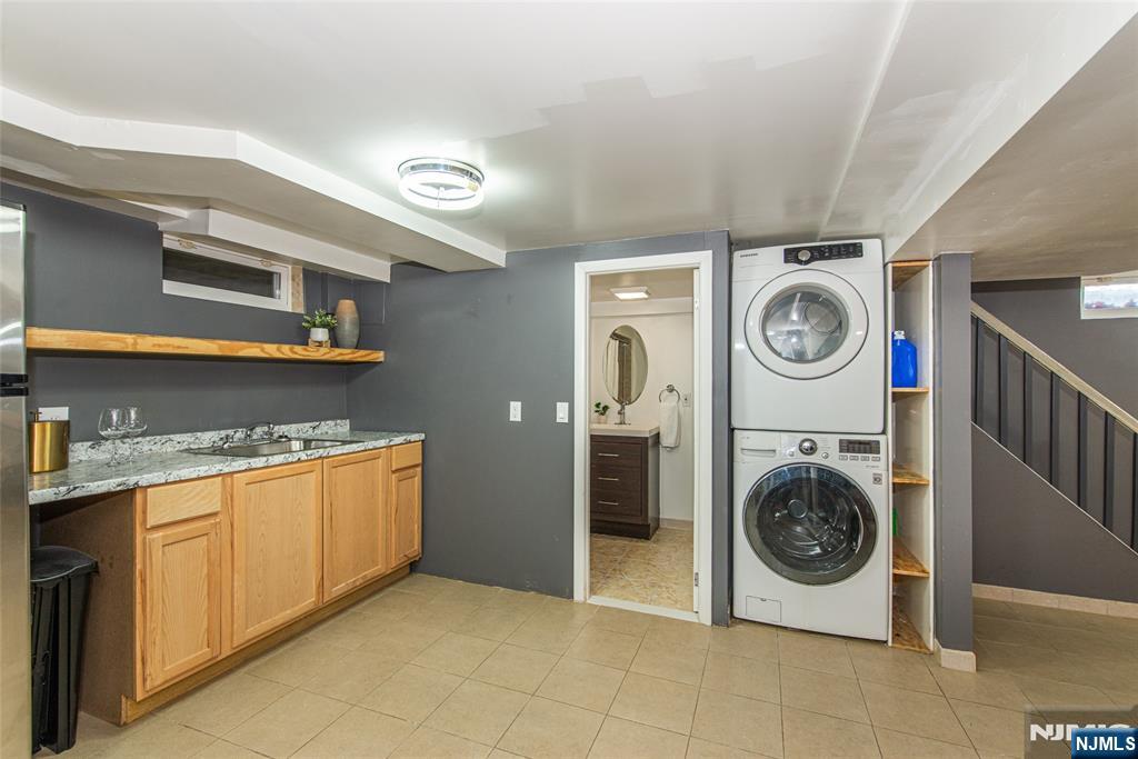 1169 Broad Street Bloomfield, NJ 07003 - Photo 40 of 47 a utility room with dryer and washer