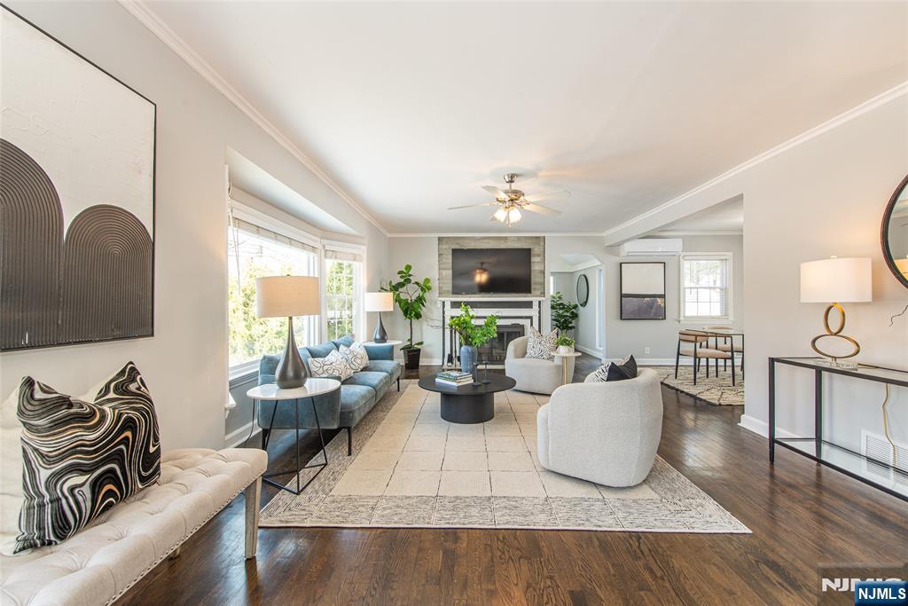 1169 Broad Street Bloomfield, NJ 07003 - Photo 4 of 47 a living room with furniture and wooden floor