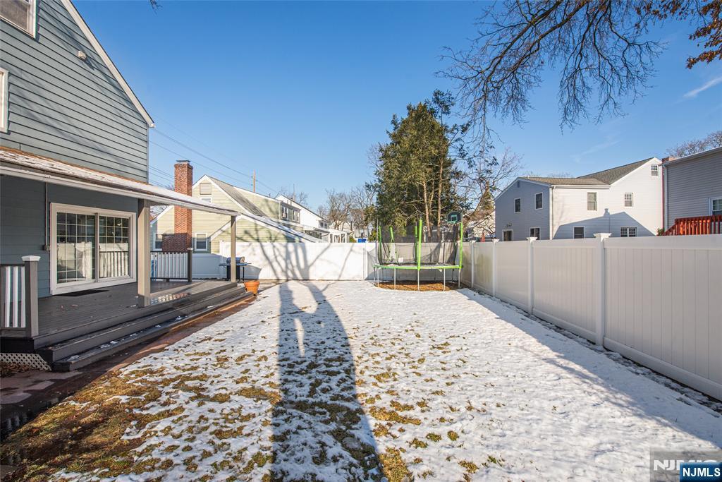 1169 Broad Street Bloomfield, NJ 07003 - Photo 45 of 47 a view of a yard with a snow on the road