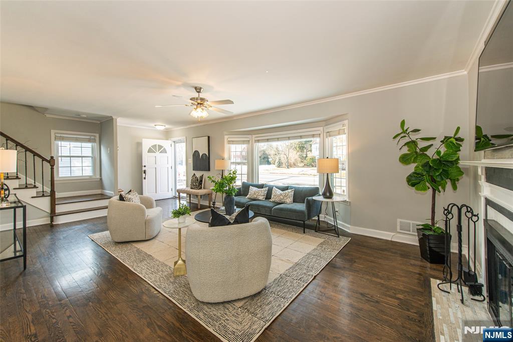 1169 Broad Street Bloomfield, NJ 07003 - Photo 7 of 47 a living room with furniture and a large window