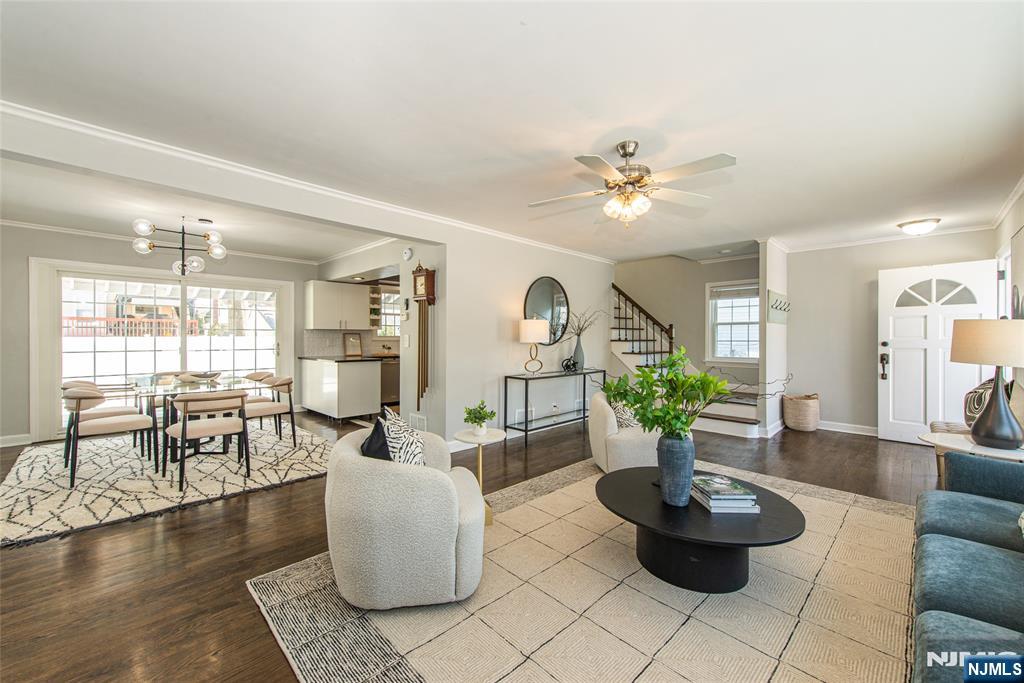 1169 Broad Street Bloomfield, NJ 07003 - Photo 8 of 47 a living room with fireplace furniture and a potted plant