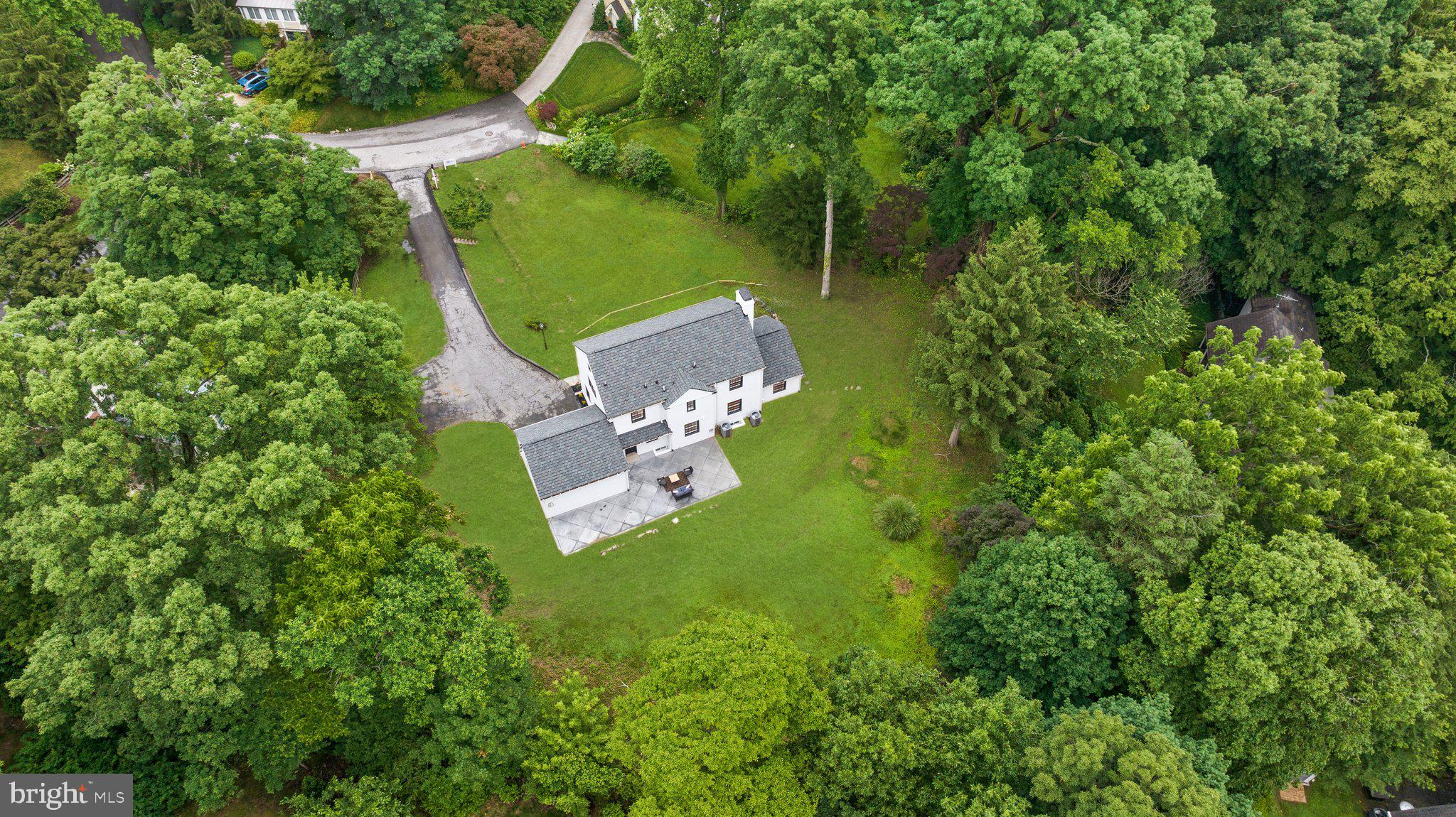 7819 Overbrook Road Ruxton, MD 21204 - Photo 22 of 80 an aerial view of a house with a yard basket ball court and outdoor seating