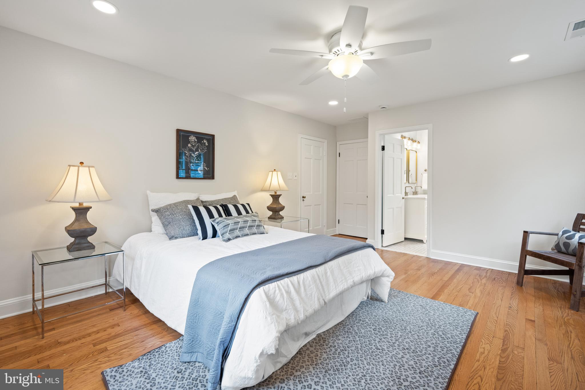 7819 Overbrook Road Ruxton, MD 21204 - Photo 40 of 80 a spacious bedroom with a bed and wooden floor