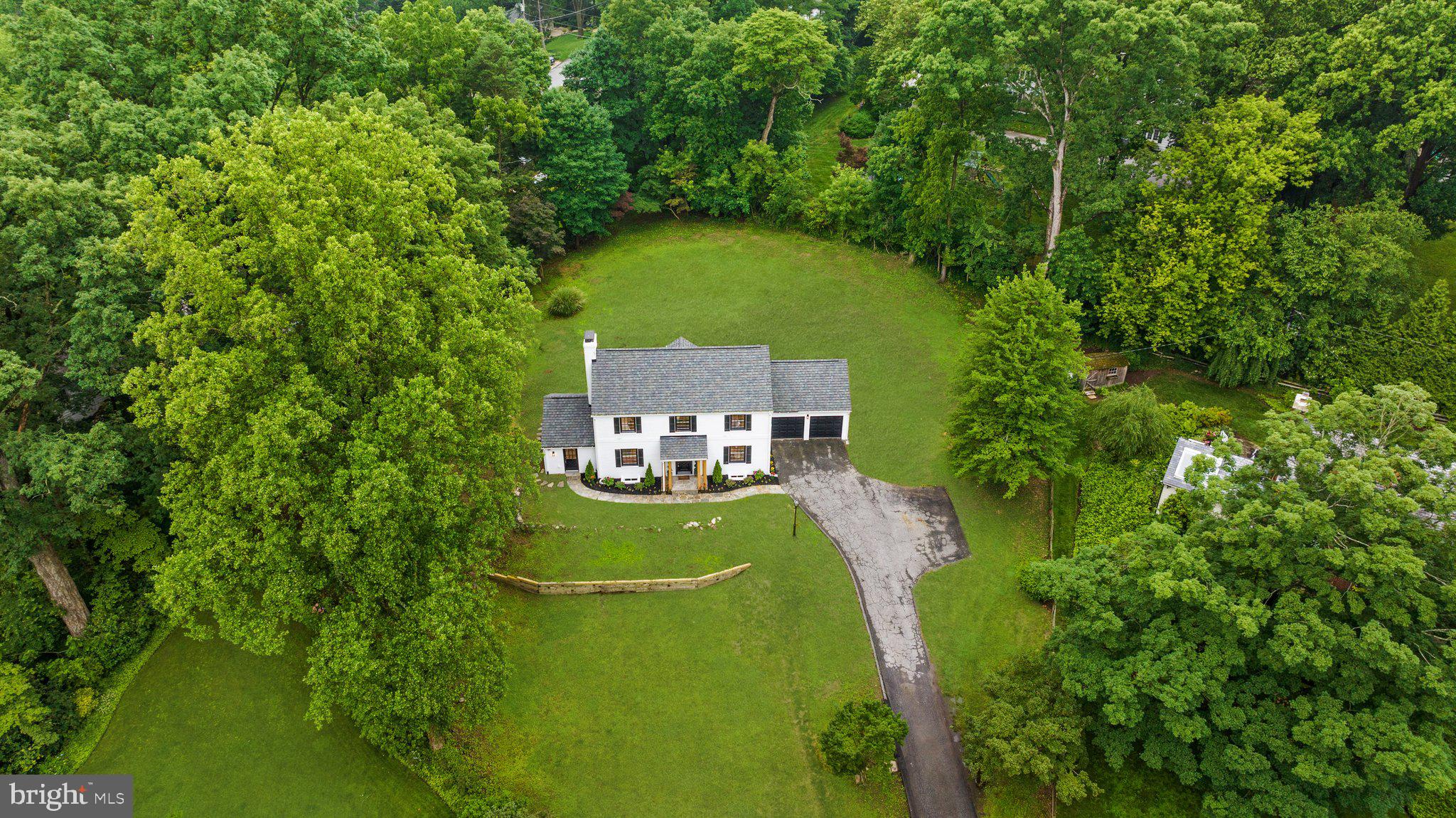 7819 Overbrook Road Ruxton, MD 21204 - Photo 4 of 80 a aerial view of a house with a yard basket ball court and trampoline
