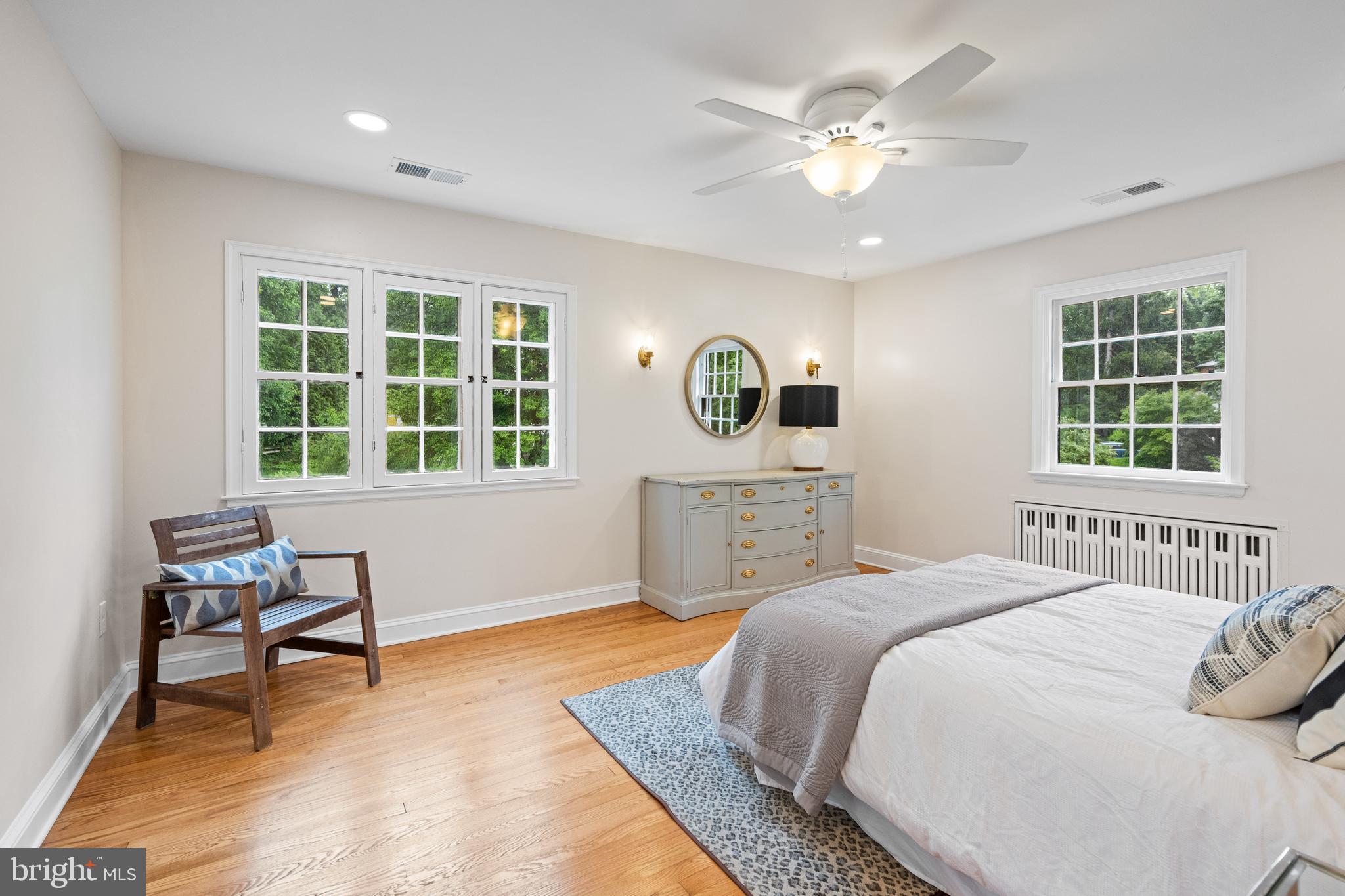 7819 Overbrook Road Ruxton, MD 21204 - Photo 41 of 80 a bedroom with a bed next to a window with a workspace