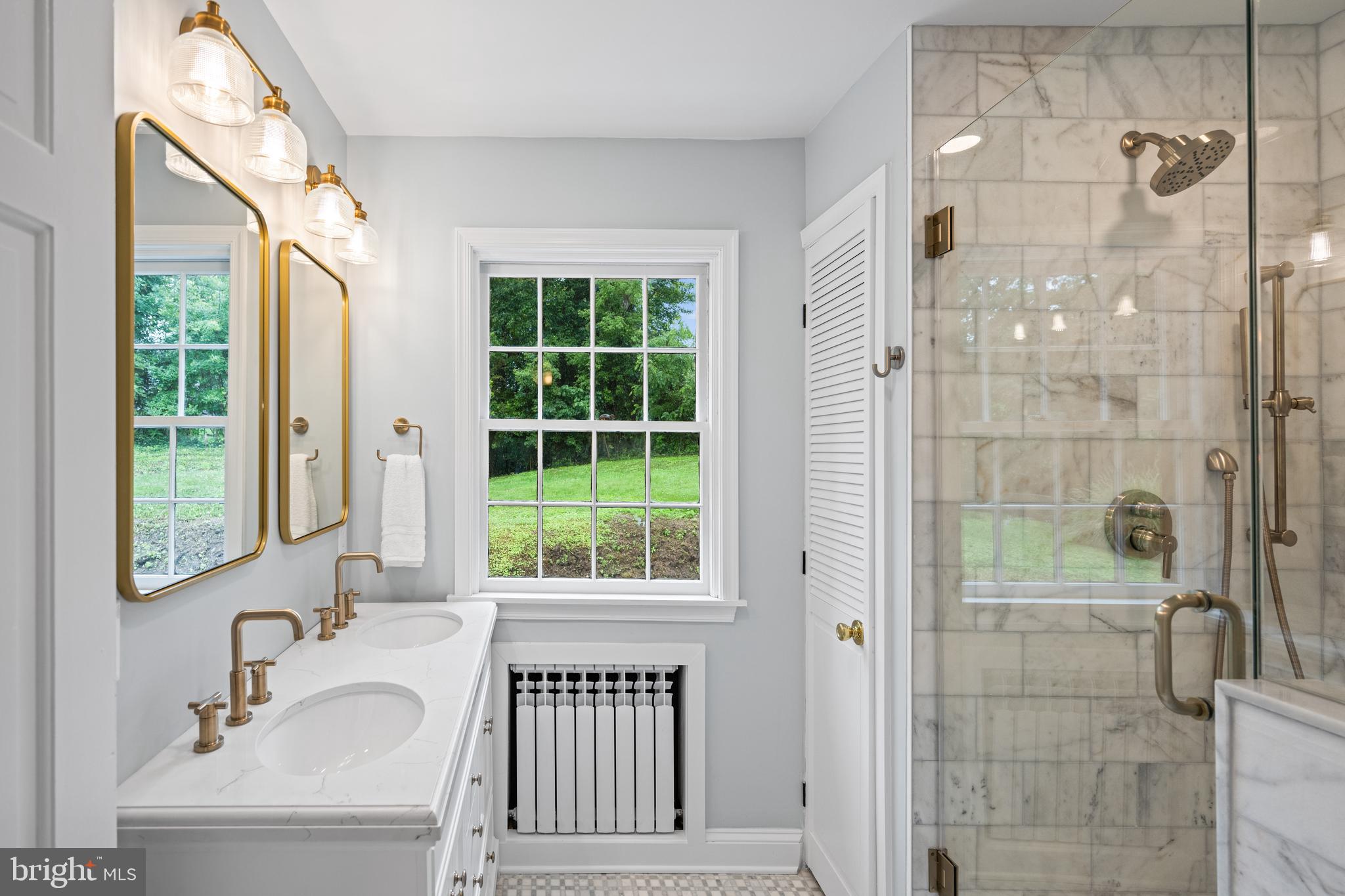 7819 Overbrook Road Ruxton, MD 21204 - Photo 43 of 80 a bathroom with a sink window and a shower