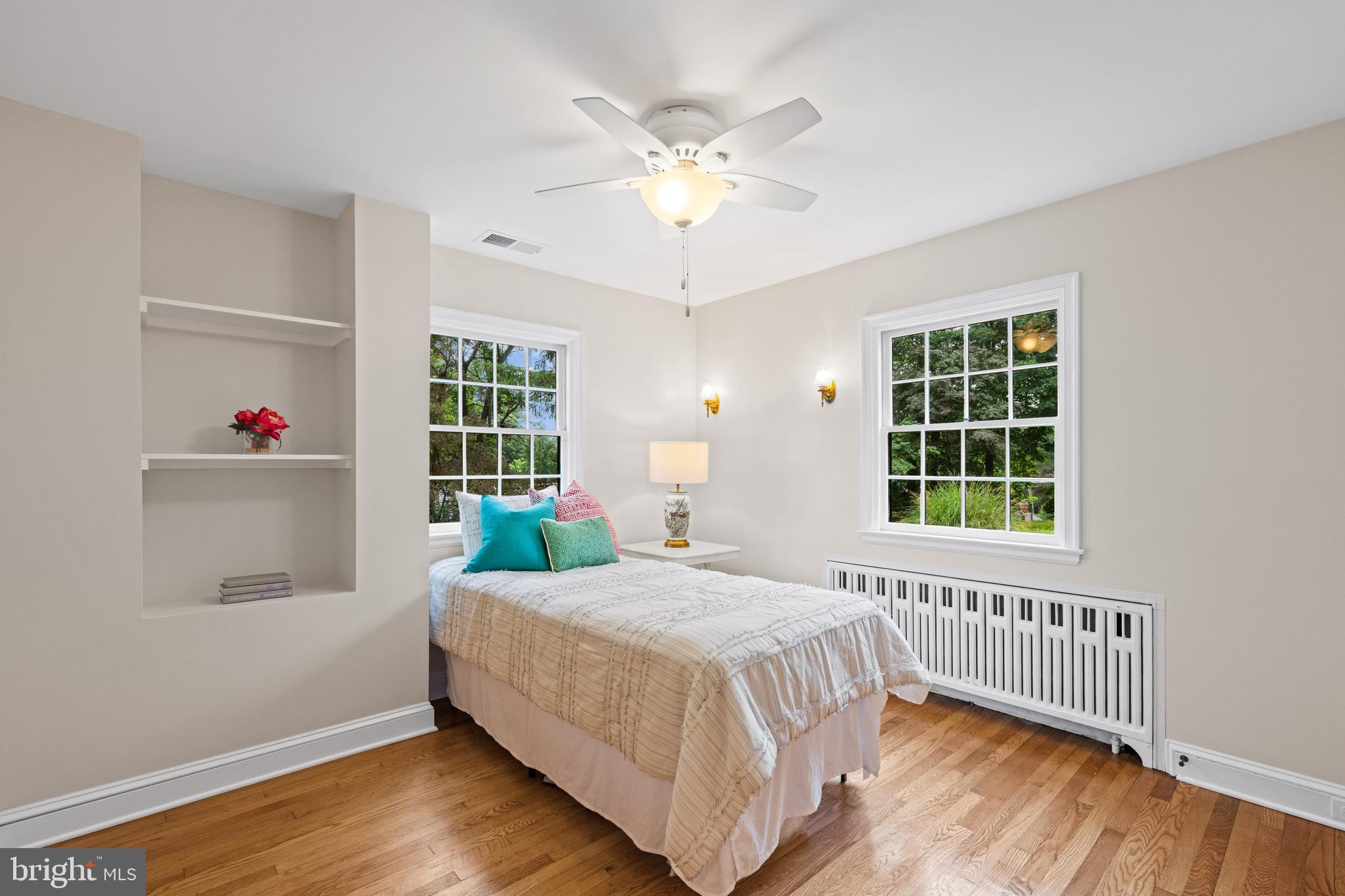 7819 Overbrook Road Ruxton, MD 21204 - Photo 53 of 80 a bedroom with a bed and a window with wooden floor