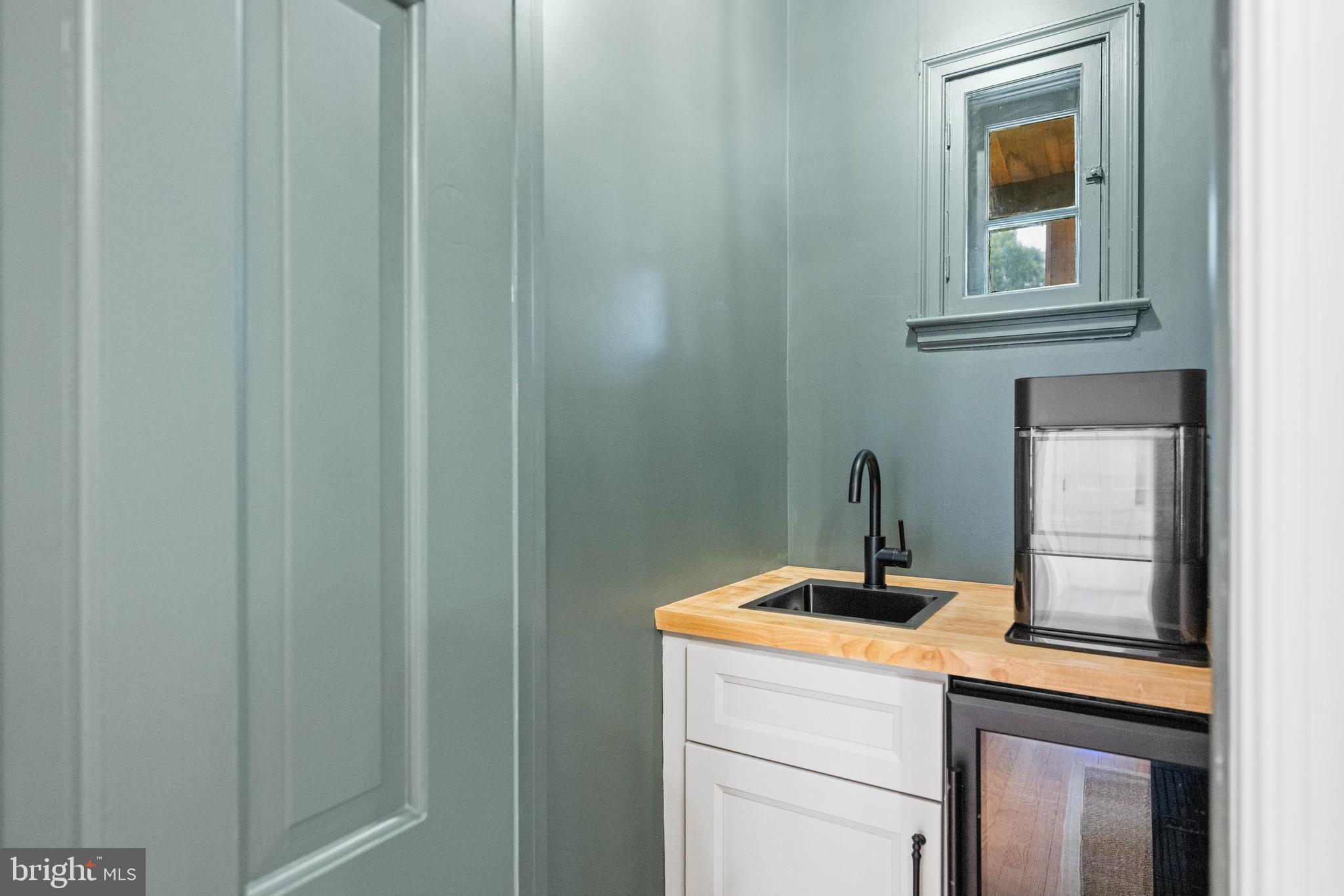 7819 Overbrook Road Ruxton, MD 21204 - Photo 58 of 80 a bathroom with a sink and a mirror