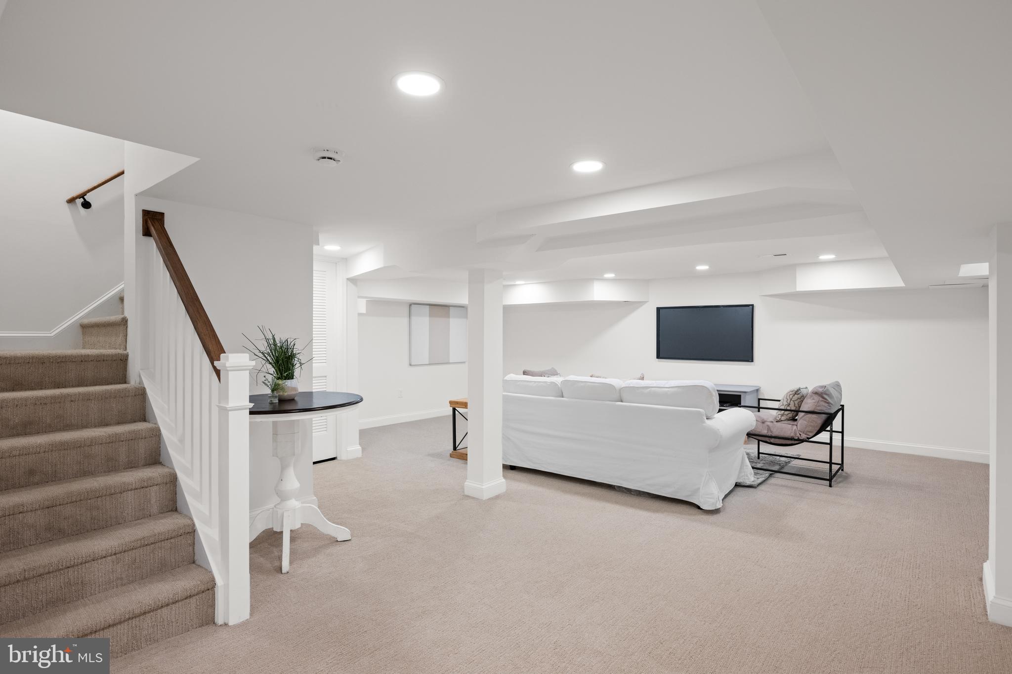 7819 Overbrook Road Ruxton, MD 21204 - Photo 62 of 80 a living room with furniture and a flat screen tv