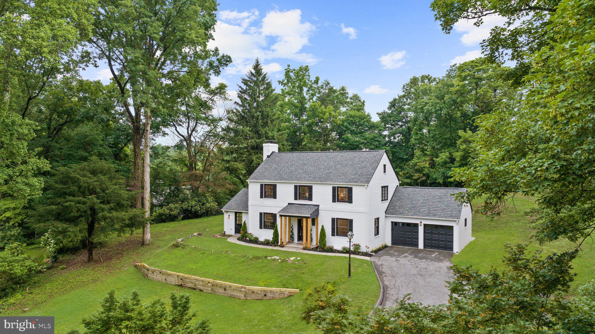 7819 Overbrook Road Ruxton, MD 21204 - Photo 76 of 80 a aerial view of a house with a yard table and chairs