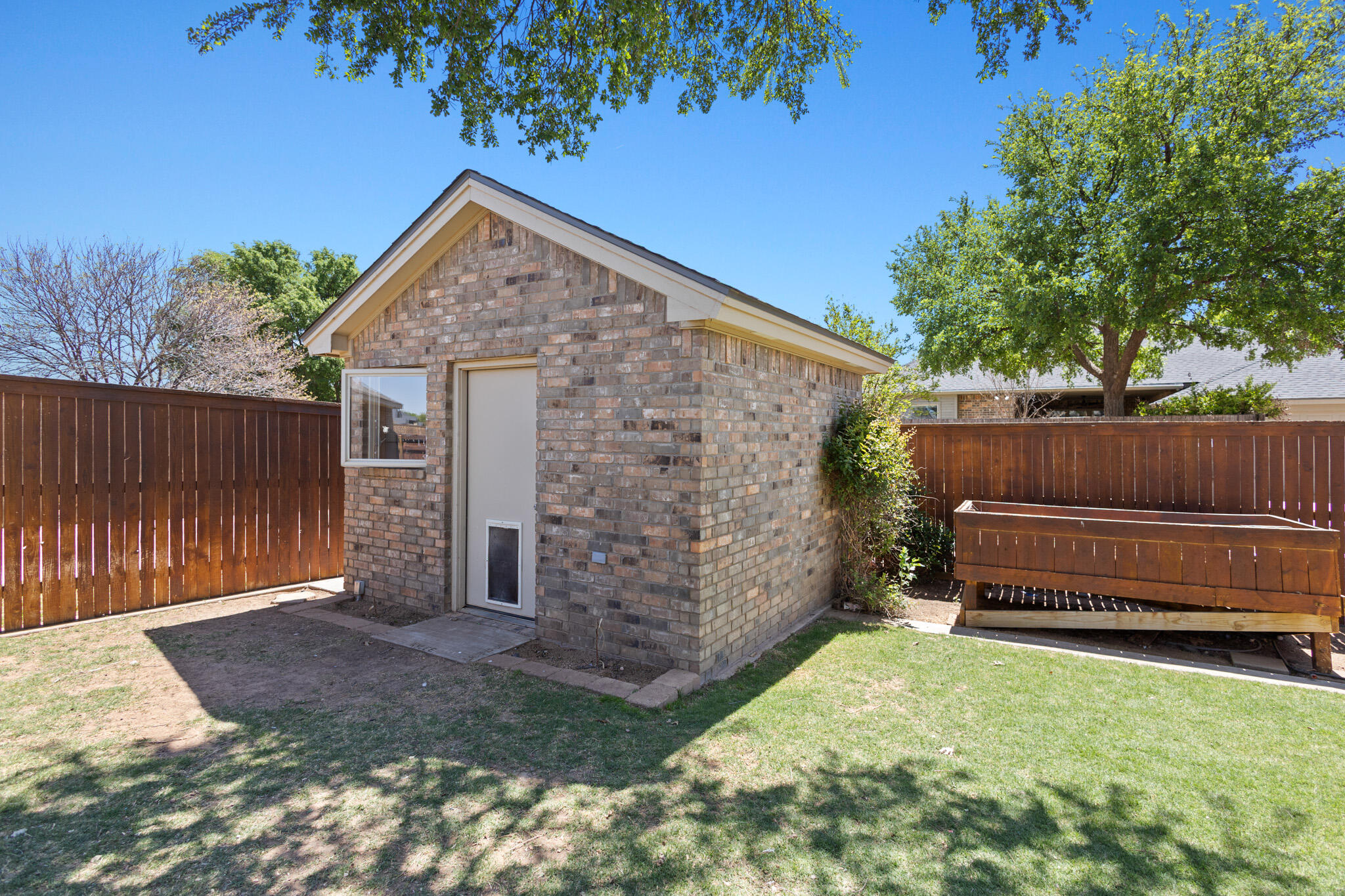 6005 93rd Street Lubbock, TX 79424 - Photo 30 of 31 front view of a house with a yard