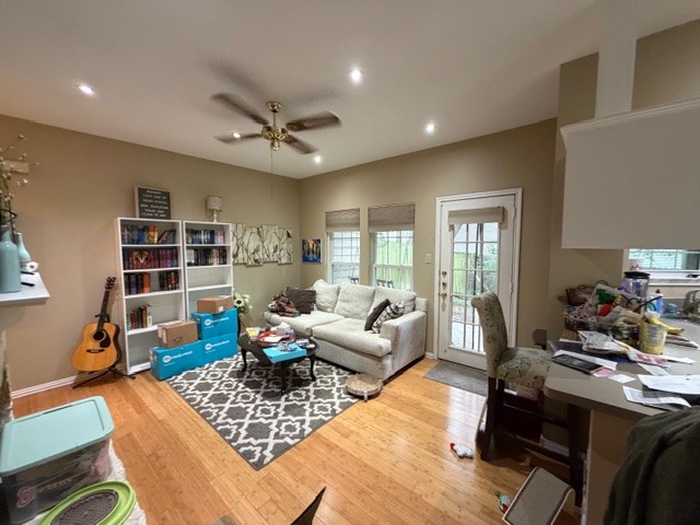 3809 Spicewood Springs Road, Unit 119 Austin, TX 78759 - Photo 2 of 14 Living area featuring hardwood flooring, a ceiling fan with light fixture, and recessed lighting