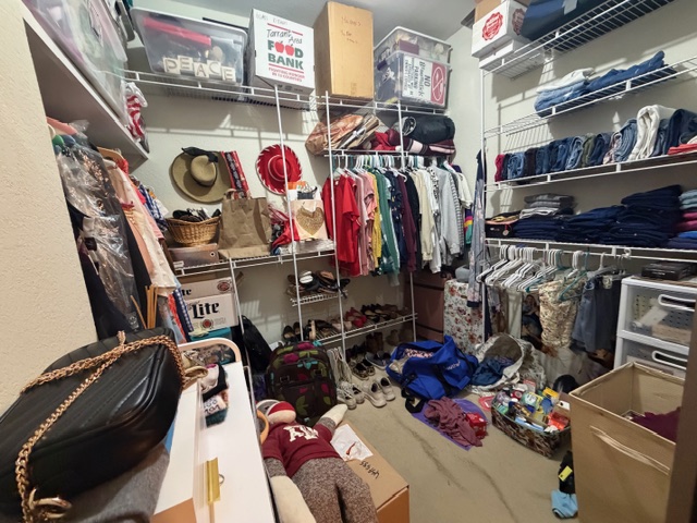 3809 Spicewood Springs Road, Unit 119 Austin, TX 78759 - Photo 9 of 14 The property features a closet with wire shelving and hanging rods for ample storage