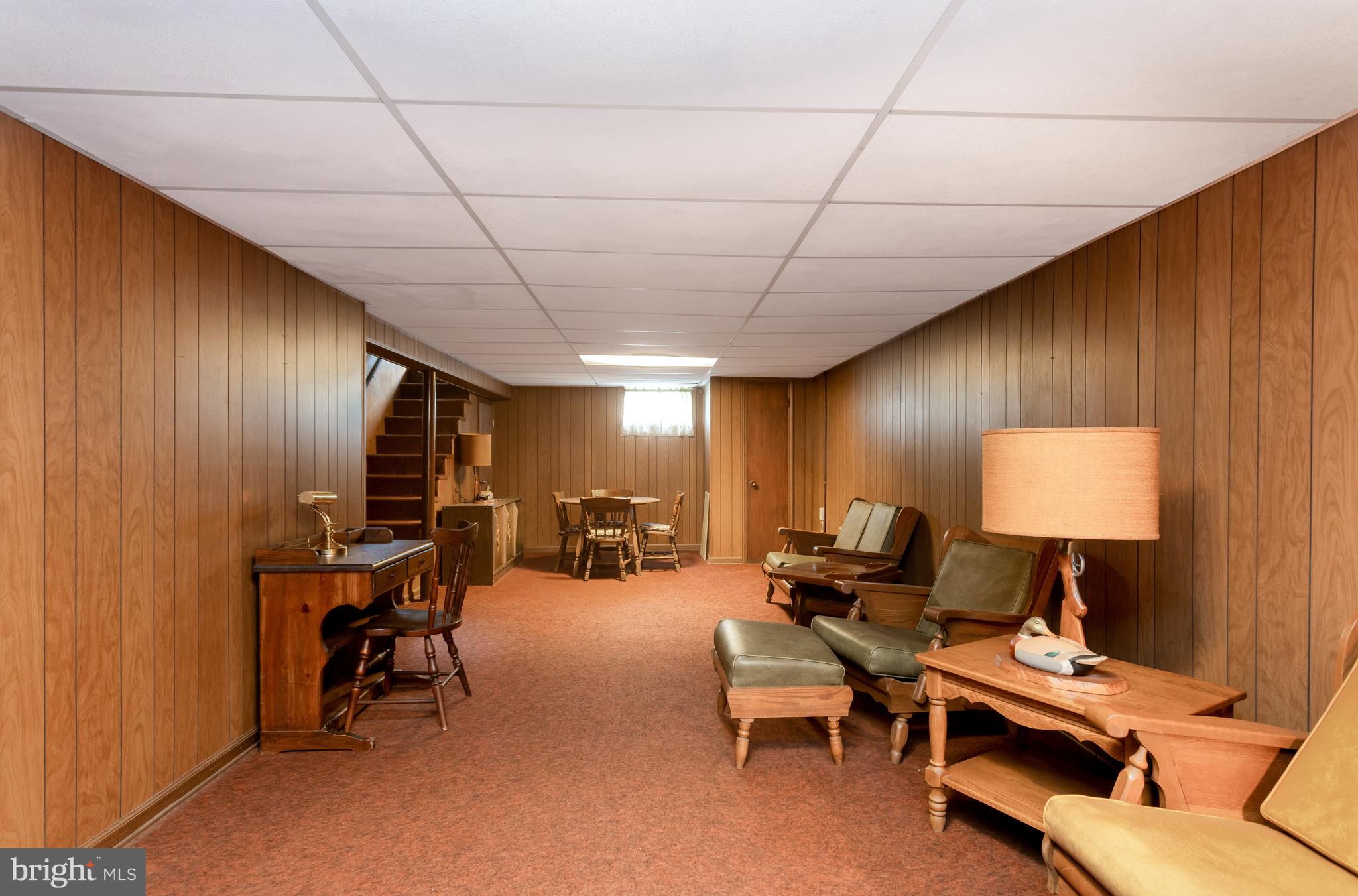 4234 Necker Avenue Baltimore, MD 21236 - Photo 17 of 29 a view of a livingroom with workspace and a window