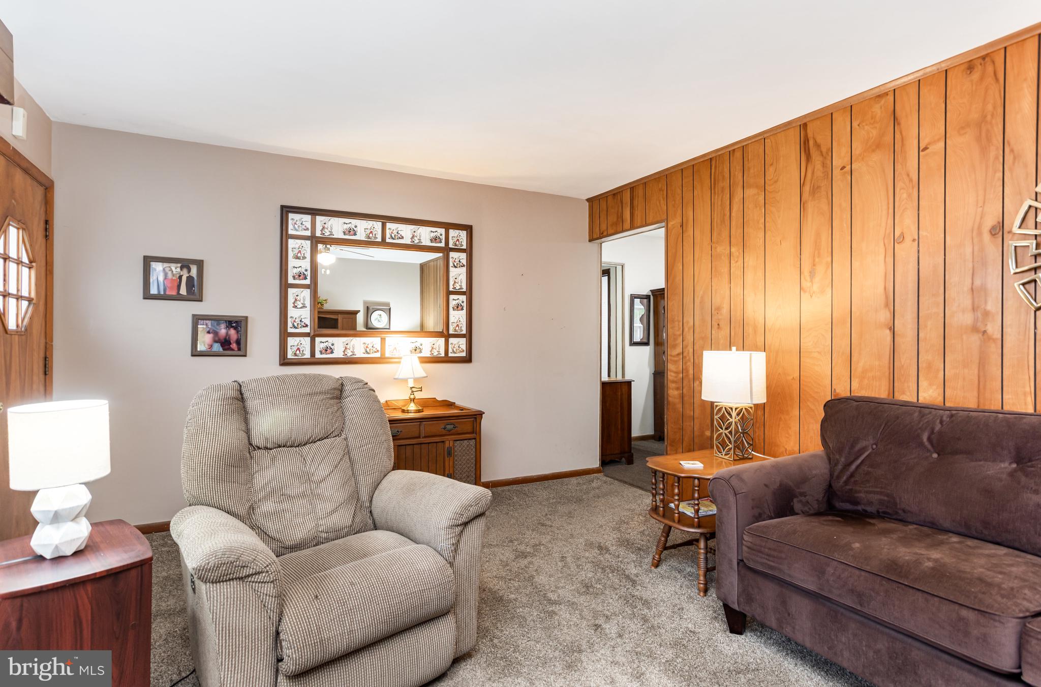 4234 Necker Avenue Baltimore, MD 21236 - Photo 2 of 29 a living room with furniture and a large window