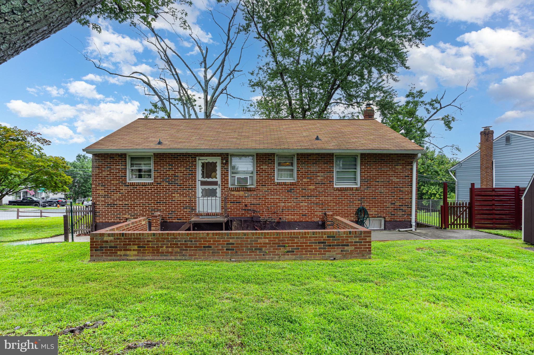 4234 Necker Avenue Baltimore, MD 21236 - Photo 23 of 29 a view of a house with a yard porch and sitting area