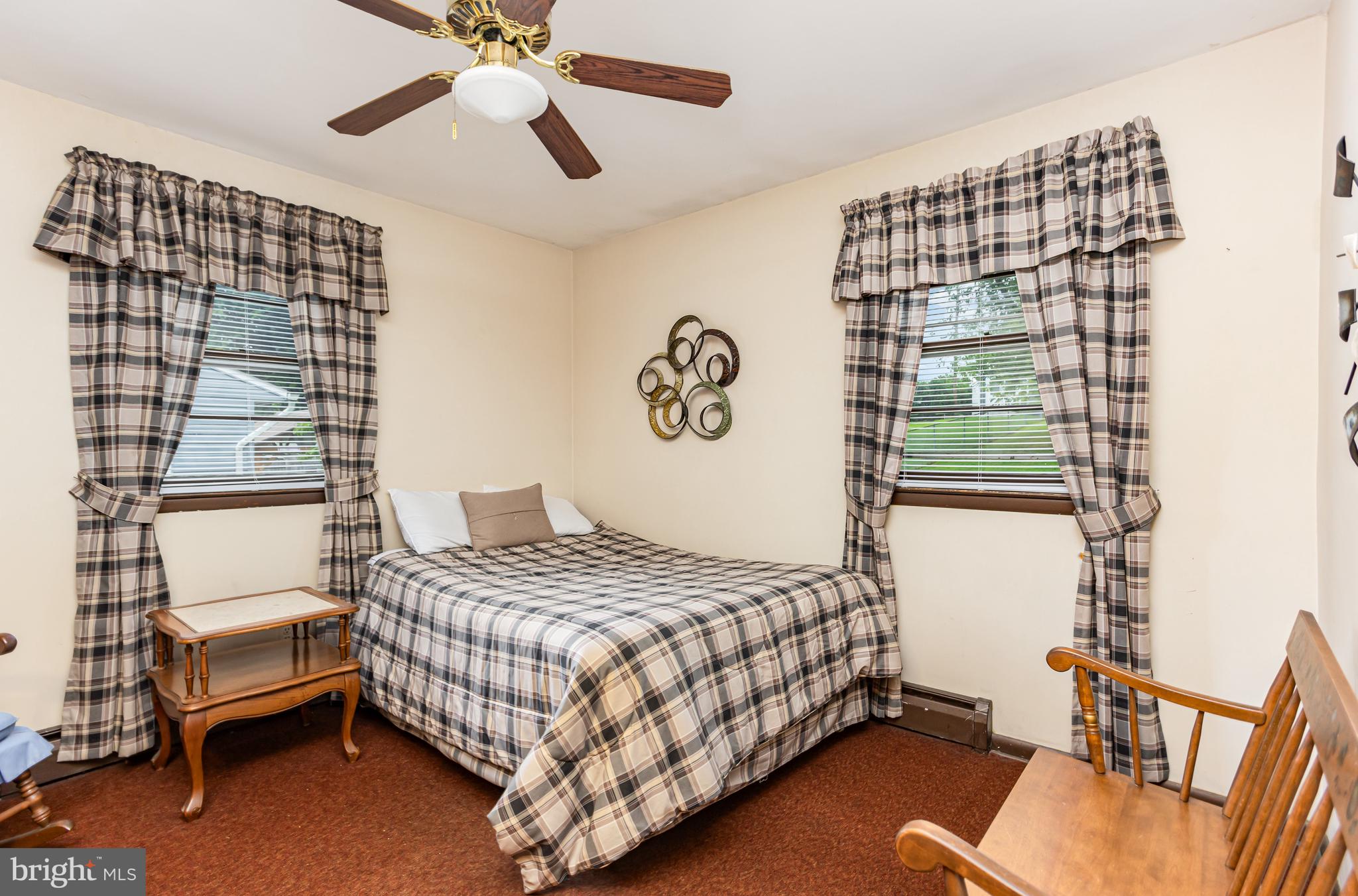 4234 Necker Avenue Baltimore, MD 21236 - Photo 9 of 29 a bedroom with a bed and furniture