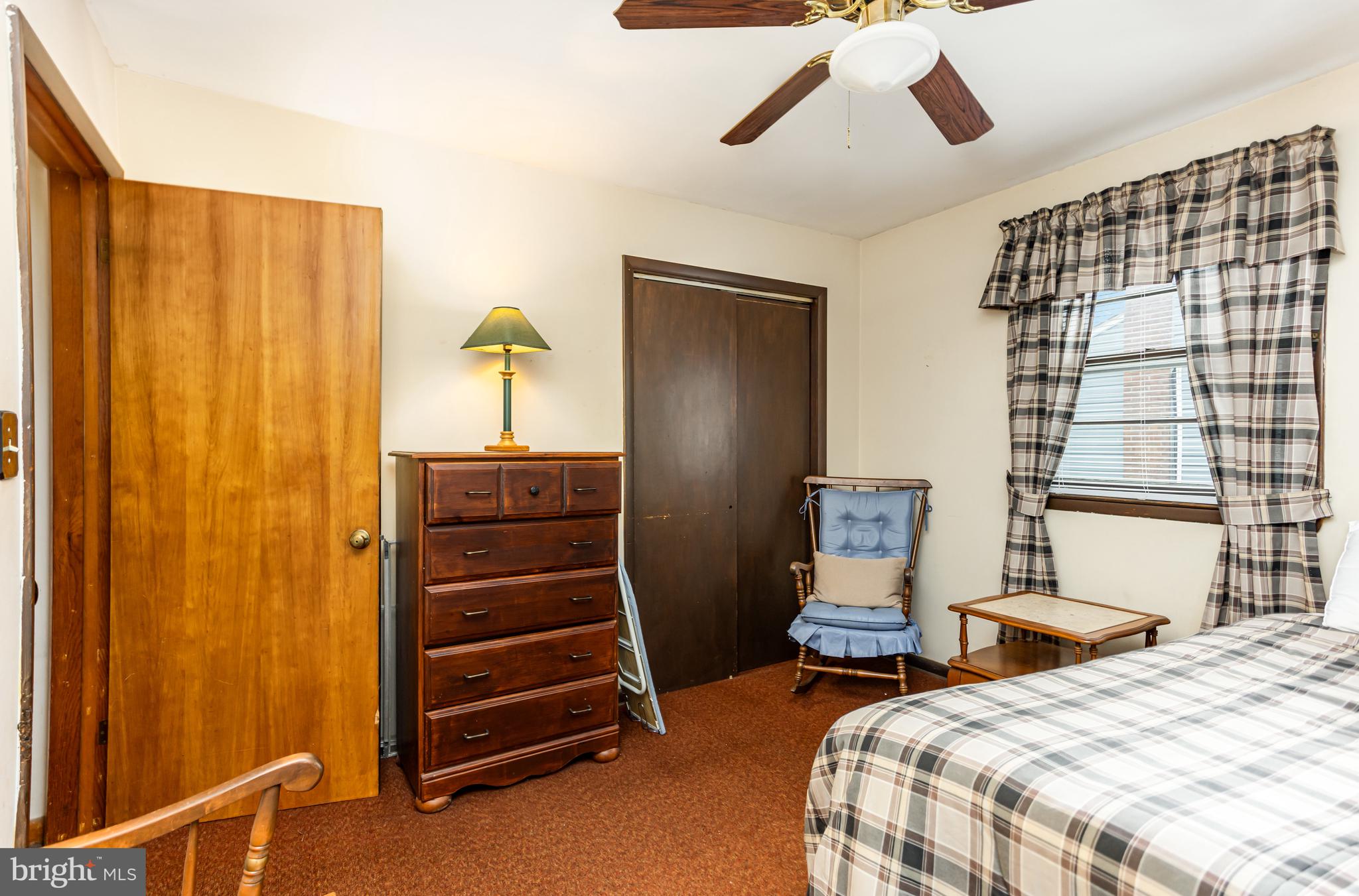 4234 Necker Avenue Baltimore, MD 21236 - Photo 10 of 29 a bedroom with a bed and a dresser