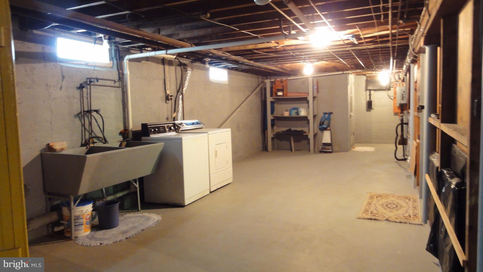 4403 Harcourt Road Baltimore, MD 21214 - Photo 22 of 25 Laundry Room w/Toilet & Sink