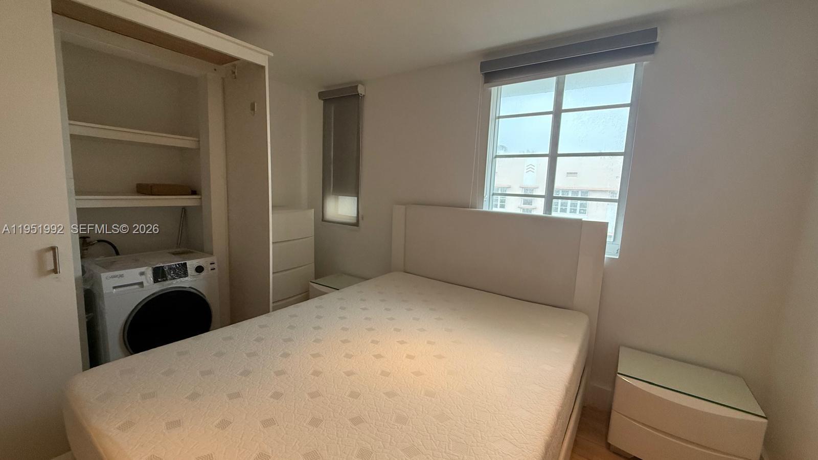 600 15th Street, Unit 9 Miami Beach, FL 33139 - Photo 7 of 12 a view of empty room with washer and dryer