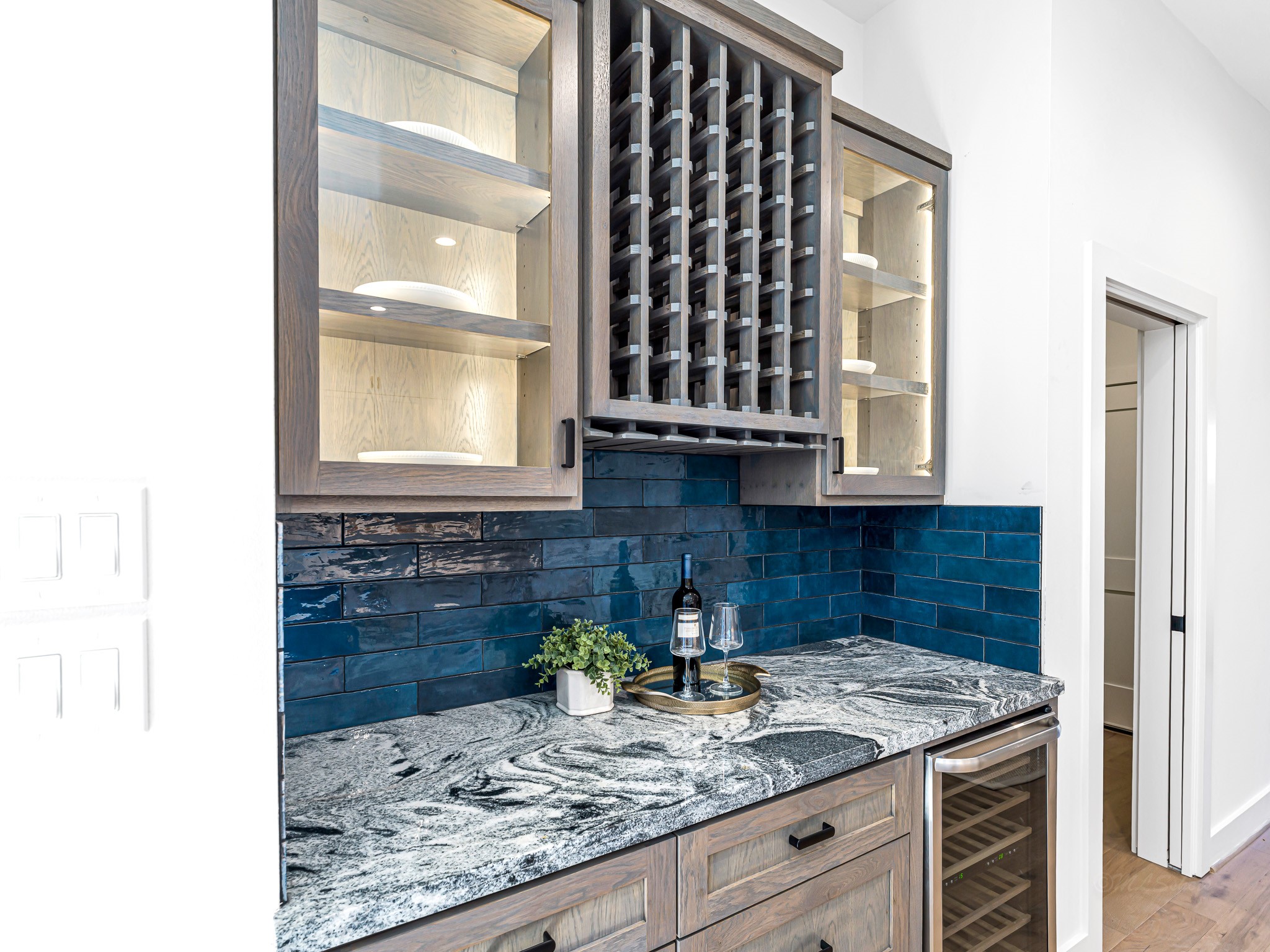 1207 Tabor Street Houston, TX 77009 - Photo 11 of 46 a kitchen with a granite countertop sink and cabinets